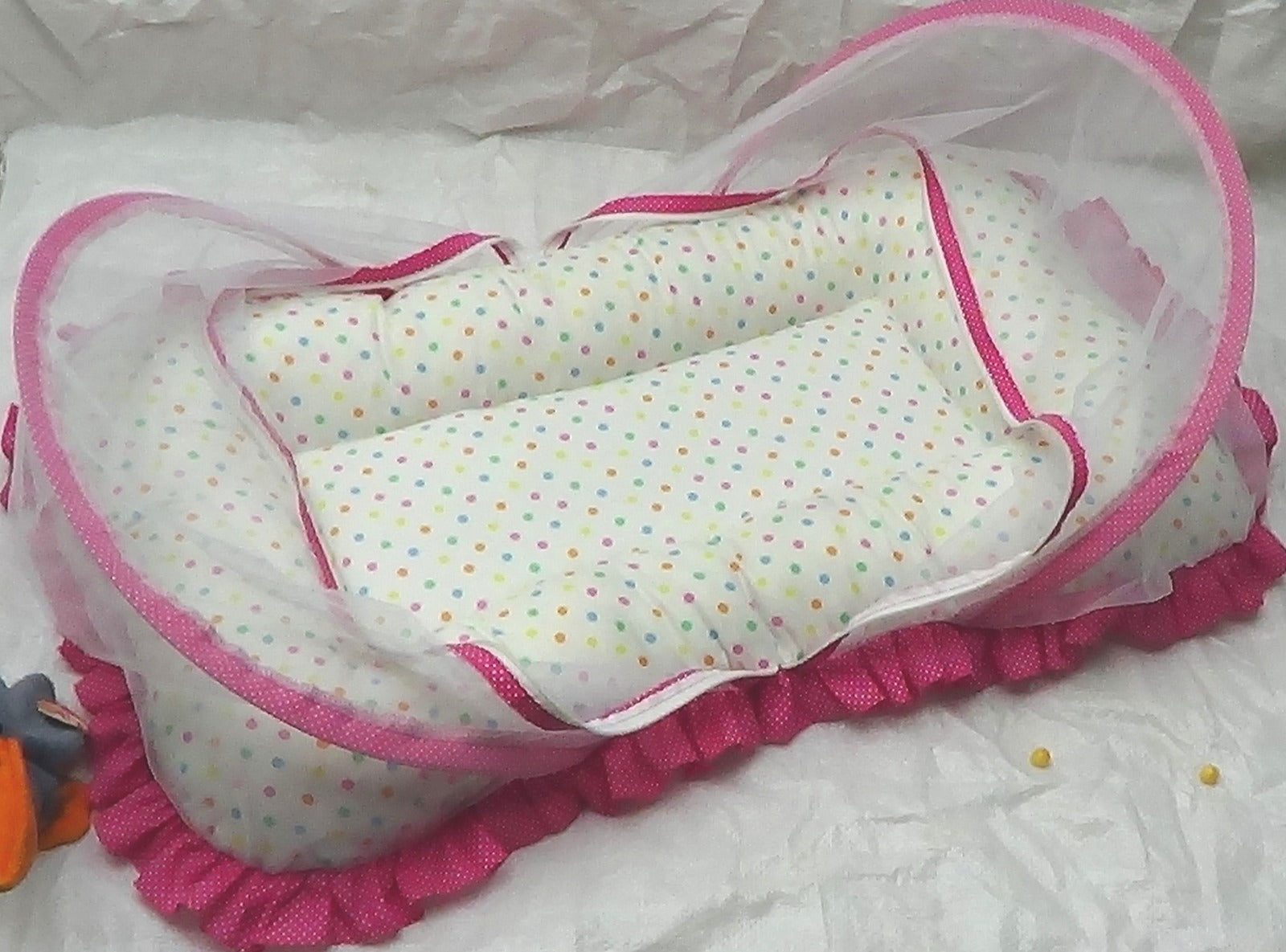 pink and white Bednet