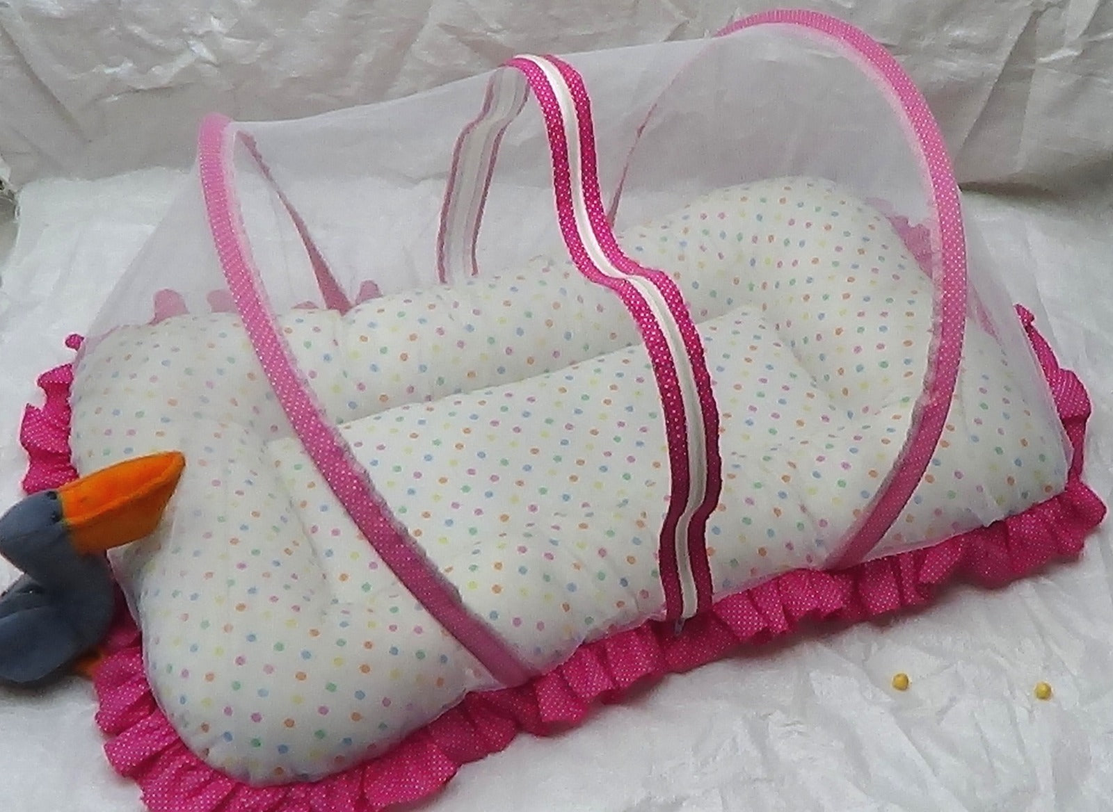 pink and white Bednet